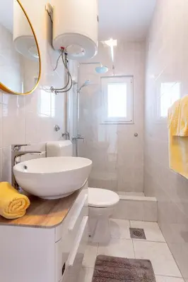 Kupaonica u objektu Apartments Dobrila