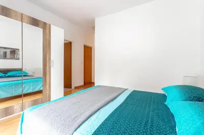 Krevet ili kreveti u jedinici u objektu Apartments Dobrila