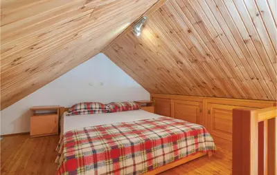 Krevet ili kreveti u jedinici u objektu 0-Bedroom Holiday Home In Postira