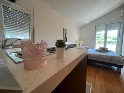 Krevet ili kreveti u jedinici u objektu Apartments San Monte