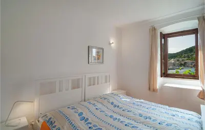 Krevet ili kreveti u jedinici u objektu One-Bedroom Apartment In Pucisca