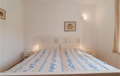 Krevet ili kreveti u jedinici u objektu One-Bedroom Apartment In Pucisca