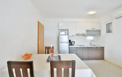 Kuhinja ili čajna kuhinja u objektu One-Bedroom Apartment In Stanici