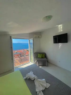 TV i/ili zabavni centar u objektu Apartmani ABA