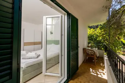 Krevet ili kreveti u jedinici u objektu Apartments by the sea Cove Pokrivenik, Hvar - 10427