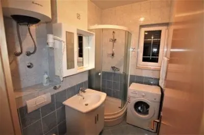 Kupaonica u objektu J&B - Beachside Studio Apartment