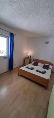 Krevet ili kreveti u jedinici u objektu Apartmani Marijana
