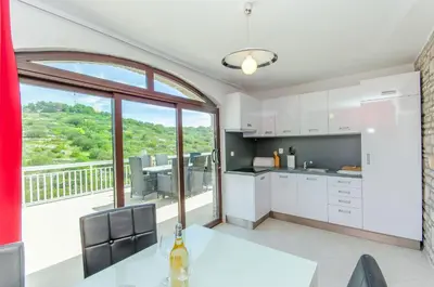 Kuhinja ili čajna kuhinja u objektu Apartments Drazen