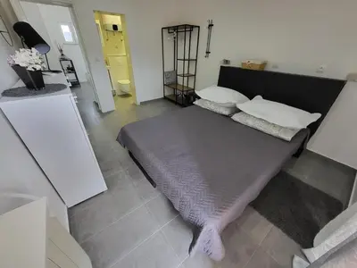Krevet ili kreveti u jedinici u objektu Apartmani Nikmar