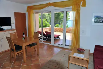 TV i/ili zabavni centar u objektu Nautilus-Bay Apartments - First Row Suites 210, 211 - Villa Gorma
