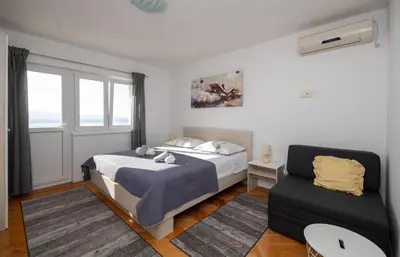 Krevet ili kreveti u jedinici u objektu Apartments Ivan
