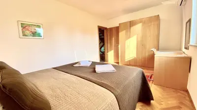 Krevet ili kreveti u jedinici u objektu Nautilus-Bay Holiday home with 5 rooms, on the beach, for 2-9 persons