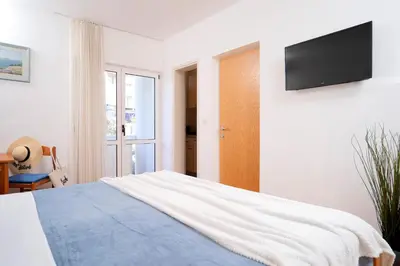 Krevet ili kreveti u jedinici u objektu Longin Guesthouse - ZF Hvar