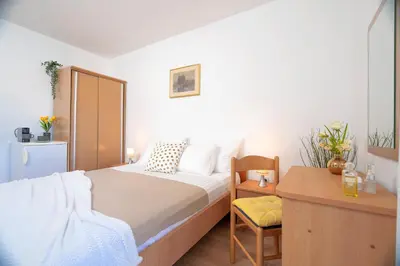 Krevet ili kreveti u jedinici u objektu Longin Guesthouse - ZF Hvar