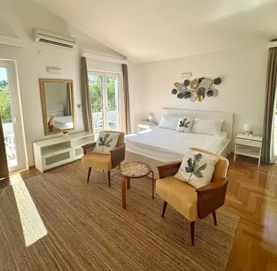 Krevet ili kreveti u jedinici u objektu Villa Hosta Apartments