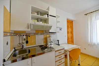 Kuhinja ili čajna kuhinja u objektu Art Apartments Postira