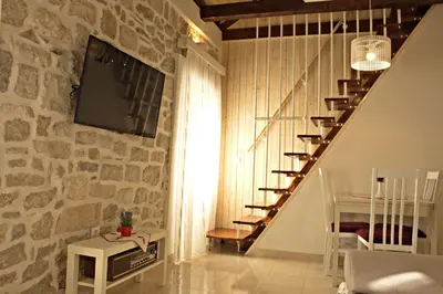 TV i/ili zabavni centar u objektu Apartment La Perla A2 BOL-CENTER