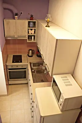 Kuhinja ili čajna kuhinja u objektu Apartment La Perla A2 BOL-CENTER
