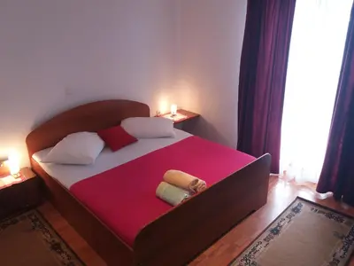 Krevet ili kreveti u jedinici u objektu Apartments by the sea Pisak, Omis - 16411