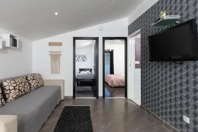 TV i/ili zabavni centar u objektu Apartments Bubalo