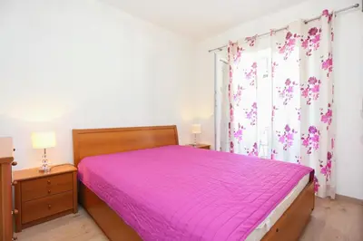 Krevet ili kreveti u jedinici u objektu Apartments with parking space Makarska - 15841