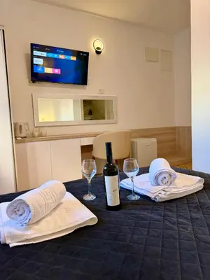 Krevet ili kreveti u jedinici u objektu Apartments & Rooms Prižmić Split