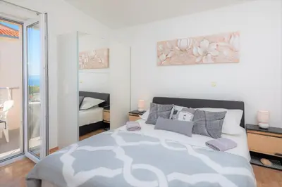 Krevet ili kreveti u jedinici u objektu FBA Family Beach Apartments