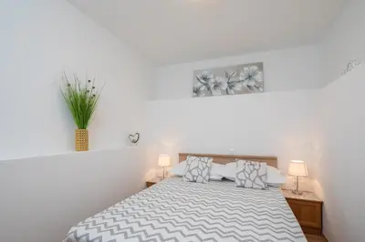 Krevet ili kreveti u jedinici u objektu FBA Family Beach Apartments