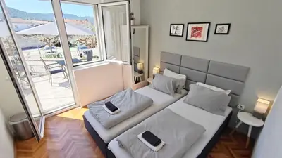 Krevet ili kreveti u jedinici u objektu Oleas Stari Grad Hvar - Private Guest Rooms - 2 Min to Sea & Center