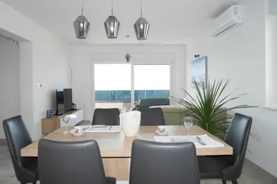TV i/ili zabavni centar u objektu Luxury Apartments Beach