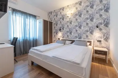Krevet ili kreveti u jedinici u objektu Apartments Amigos