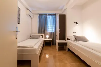 Krevet ili kreveti u jedinici u objektu Apartments Amigos