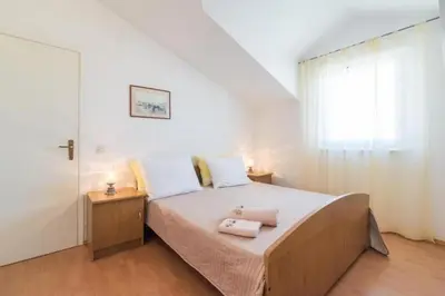 Krevet ili kreveti u jedinici u objektu Family-friendly apartments with swimming pool Supetar, Brac - 16774