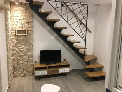 TV i/ili zabavni centar u objektu Paradise Stone Apartments