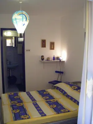 Krevet ili kreveti u jedinici u objektu Apartments Adria Blue