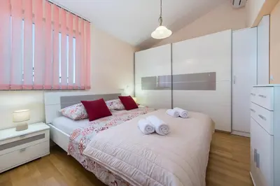 Krevet ili kreveti u jedinici u objektu Apartments Deluxe Vučko