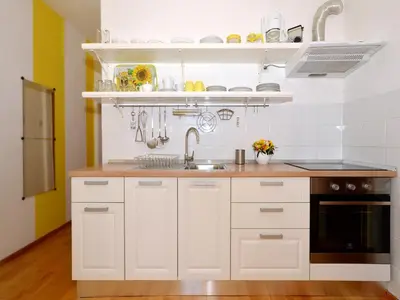 Kuhinja ili čajna kuhinja u objektu Apartments NewWay Bol
