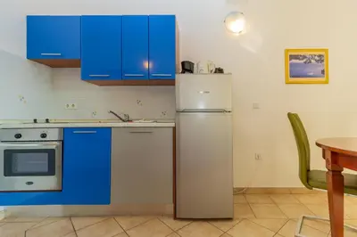 Kuhinja ili čajna kuhinja u objektu Apartments Villa Mandolina