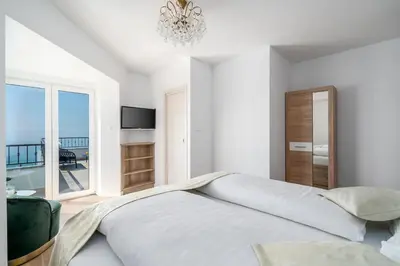 Krevet ili kreveti u jedinici u objektu Rooms Vedrana