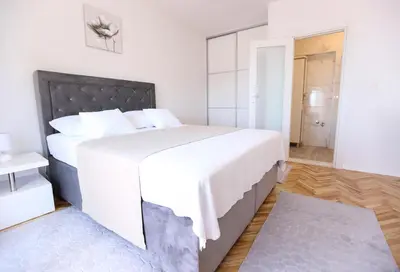 Krevet ili kreveti u jedinici u objektu APARTMANI GUTO