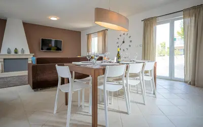 TV i/ili zabavni centar u objektu Hvaretta villas with private pools