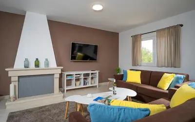 TV i/ili zabavni centar u objektu Hvaretta villas with private pools