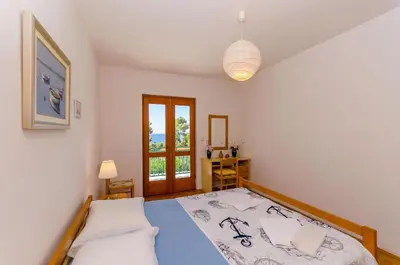 Krevet ili kreveti u jedinici u objektu Apartments Josip