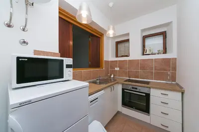 Kuhinja ili čajna kuhinja u objektu Apartments by the sea Brela, Makarska - 16950