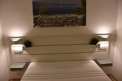 Krevet ili kreveti u jedinici u objektu BellaVista Jelsa 2+2