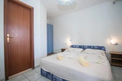 Krevet ili kreveti u jedinici u objektu Apartments and Rooms Nikol