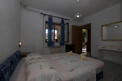 Krevet ili kreveti u jedinici u objektu Apartments and Rooms Nikol