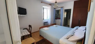 Krevet ili kreveti u jedinici u objektu Apartments Jurić - 1 A studio apartment with a view