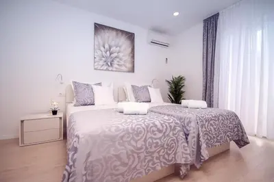 Krevet ili kreveti u jedinici u objektu Villa Dasianda - only 90 m from the beach, private 30msq heated pool