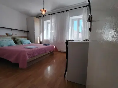 Krevet ili kreveti u jedinici u objektu Apartments - 3 A beautiful apartment with a sea view